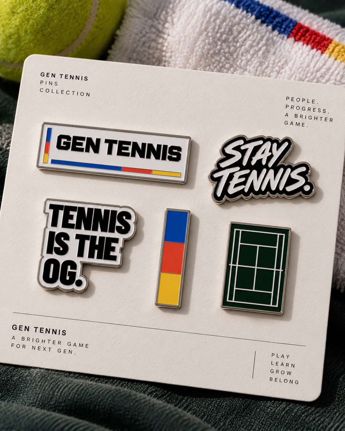 Pin set concept featuring Stay Tennis, Tennis is the OG, the GEN Tennis signature and court graphics